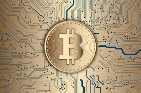 Rise of the Cryptocurrencies image of Bitcoin on digital board