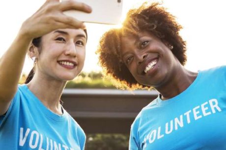 Charitable Giving volunteers taking selfie.