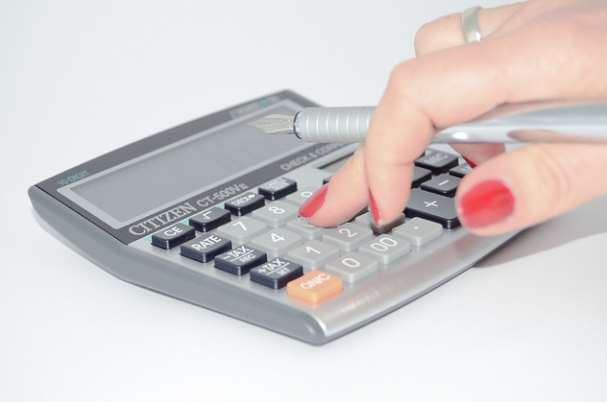 Is Your 401(k) Accurate, Showing Calculations Being Made on Calculator