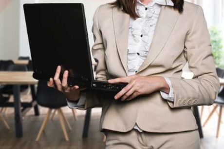 Identity Theft With Woman Holding Laptop