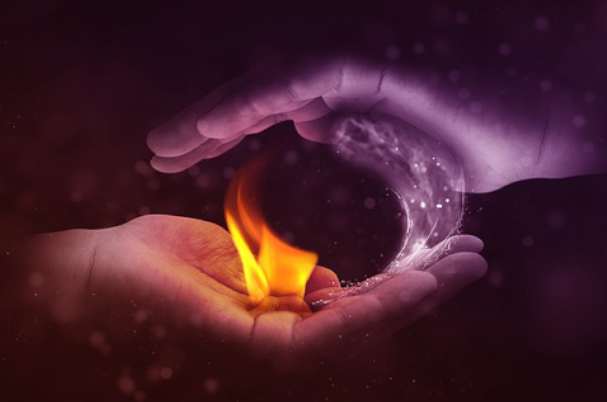 Color of Risk Tolerance and Perception hands holding fire and ice.