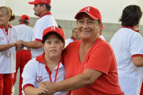 ABLE Accounts with image of woman and disabled child playing in a little league game.