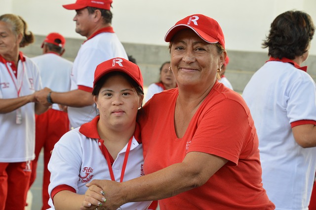 ABLE Accounts with image of woman and disabled child playing in a little league game.