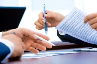 Buy Sell Agreement Shows Business People Discussing a Contract