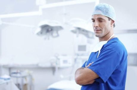 Managing Healthcare Costs surgeon in operating room.