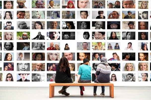 SECURE Act depicts community of people on board as three people sit on a bench looking at them.