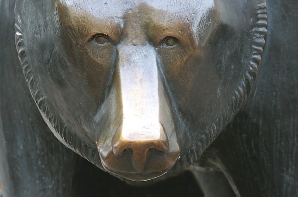 Your Investing Strategy with metal bear statue.