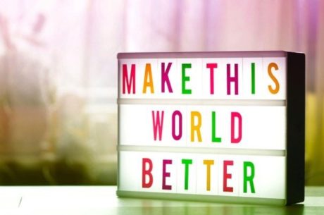 Charitable Giving Incentives depicts sign that says to make this world better.