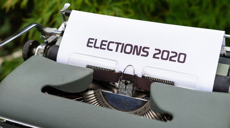 Special Presidential Election Update and Predictions shows typewriter with elections 2020 words.