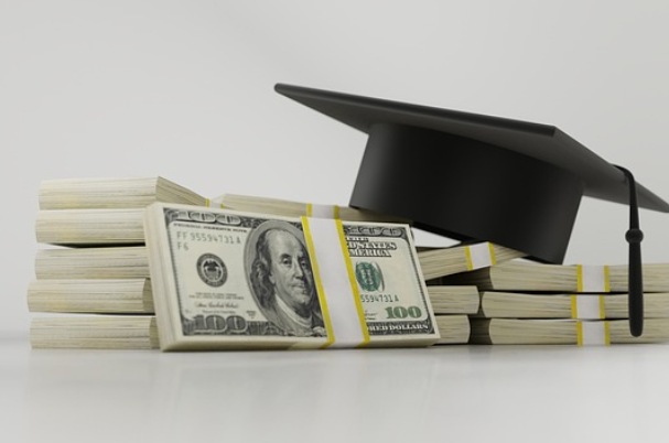 The CARES Act Student Loan Relief Options shows graduation cap on stack of cash.