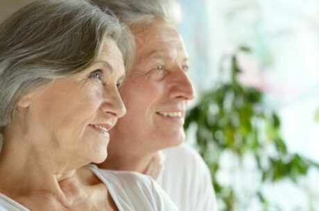 Caring for an Aging Parent depicts elderly man and woman looking sideways from camera.