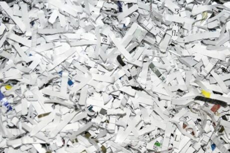 Common Records-Retention Questions Shows Shredded Documents.