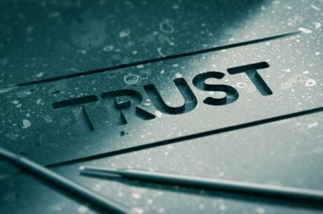 Considerations in trust funding image of engraved word in stone.