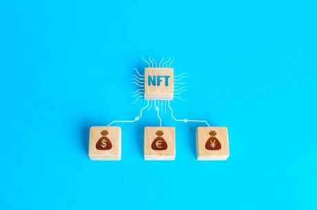 What is an NFT photo depicts wood money blocks.