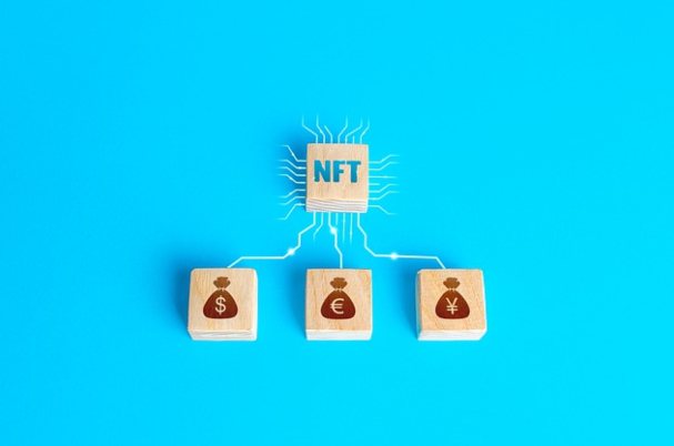 What is an NFT photo depicts wood money blocks.