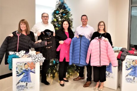 Jacqueline Kennedy's Coats for Kids Coat Drive photo of Lewisville office staff members..