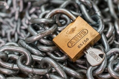 Lock and key represents avoiding social engineering scams.