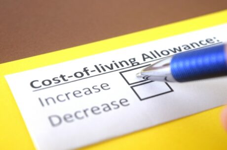 One person determining if they should take early retirement while answering question about cost of living allowance.